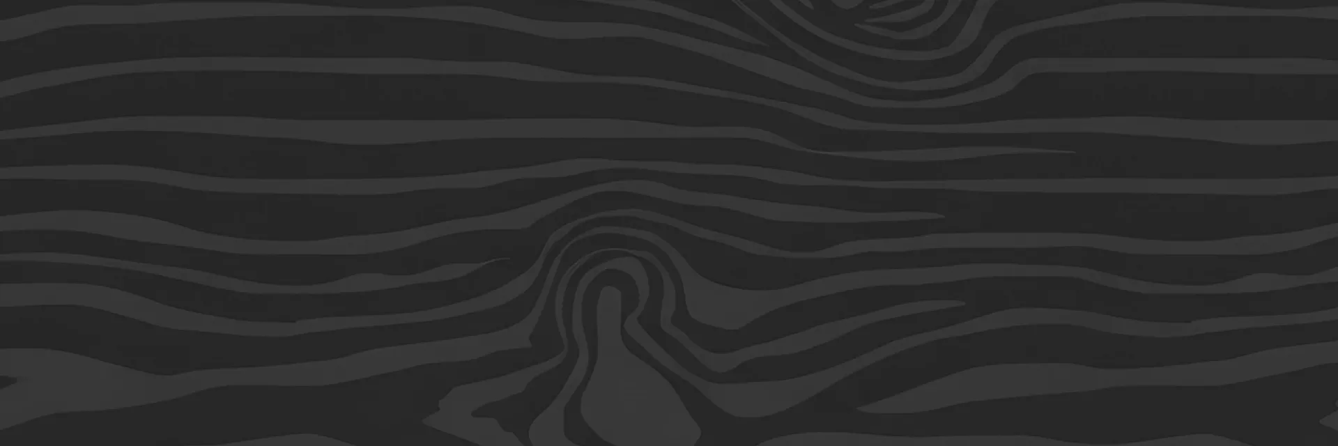 Dark, abstract wood-grain pattern with flowing curved lines in black and charcoal tones.